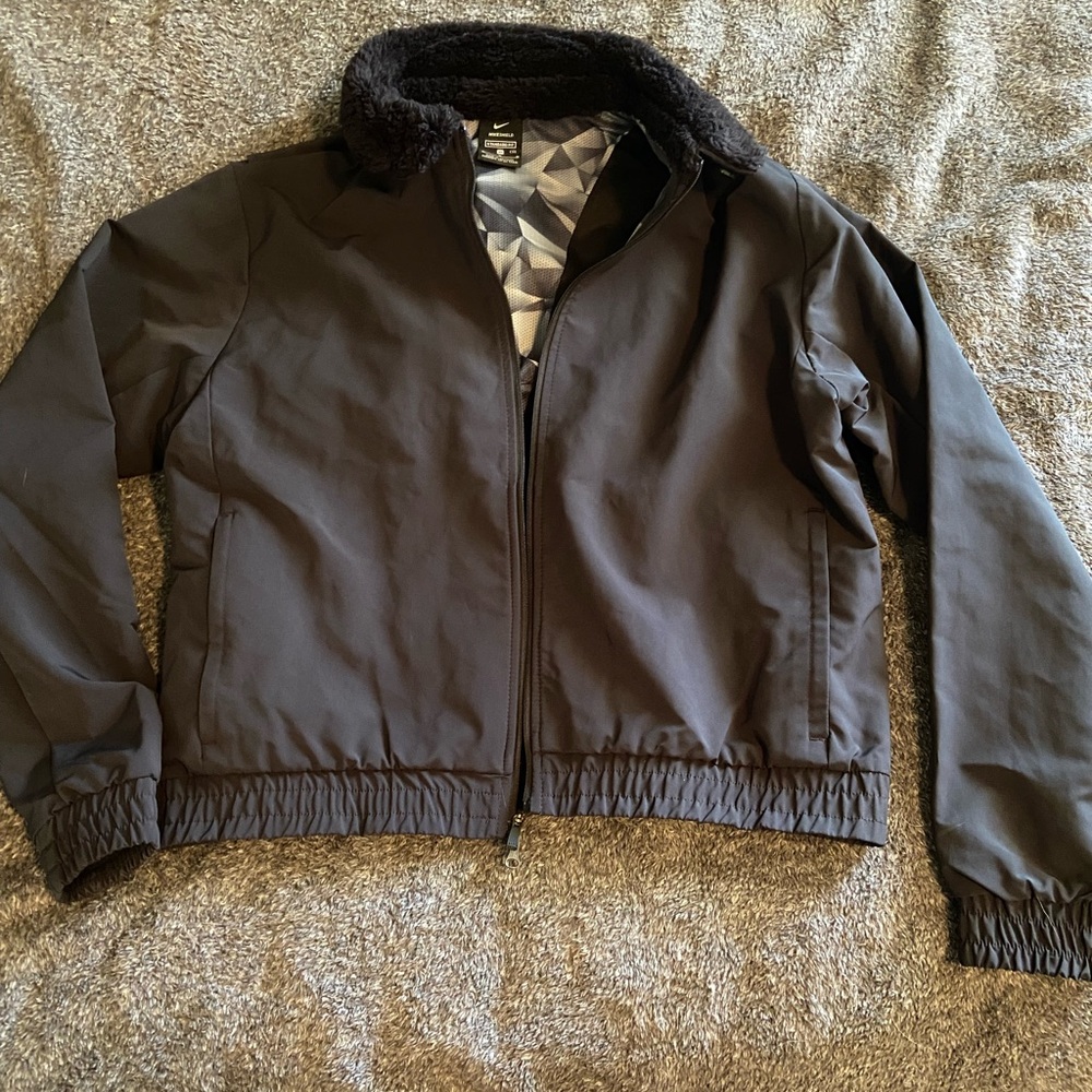 Nike cropped workout jacket. Size medium, never worn.